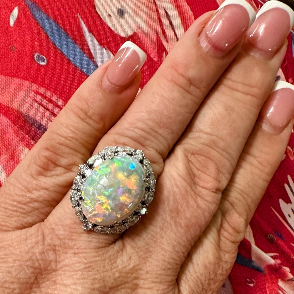 SOLD…. Elegant Opal and diamond platinum Women's Ring